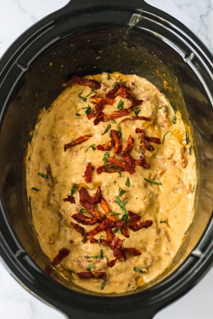 Crockpot marry me pork chops in a slow cooker.