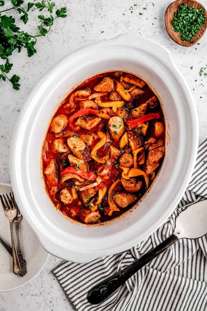 Sausage, peppers and onions in a crockpot.