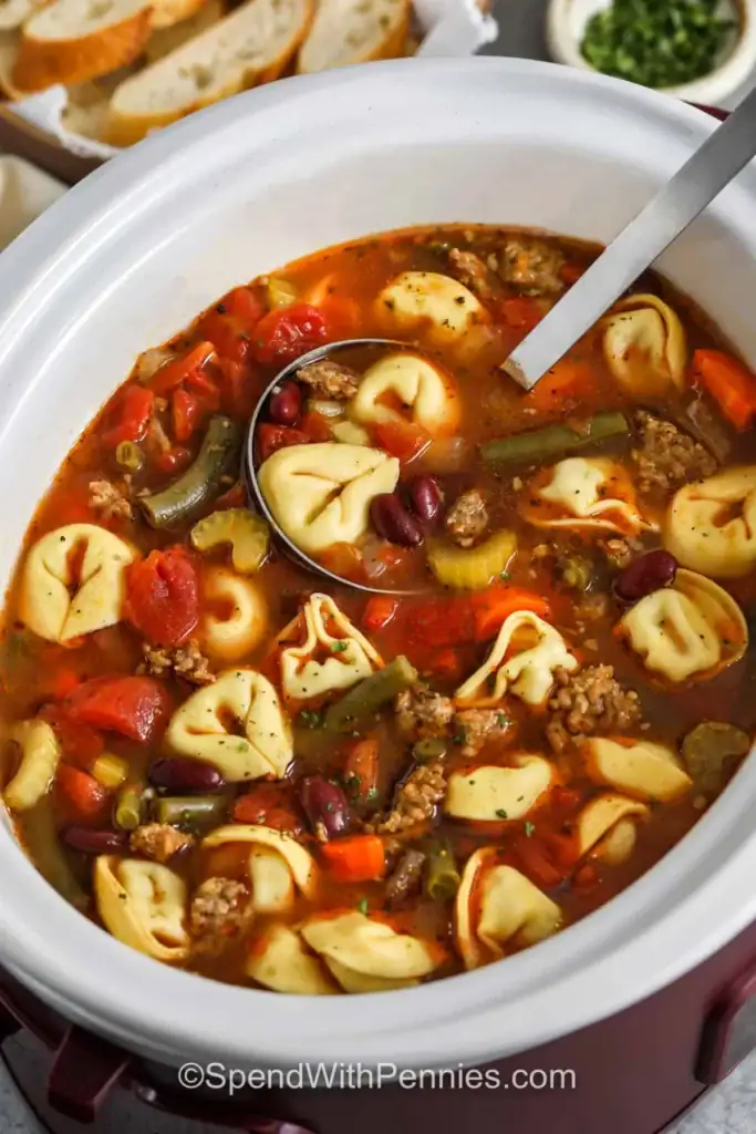 Tortellini soup in a slow cooker.