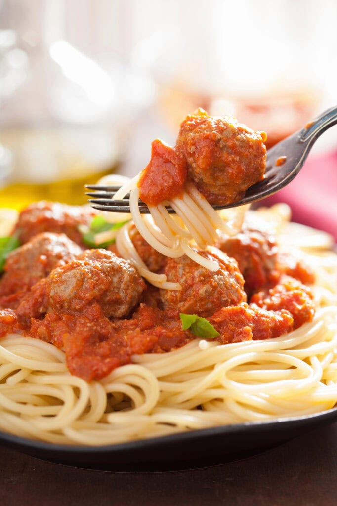 Meatballs with spaghetti and tomato sauce.