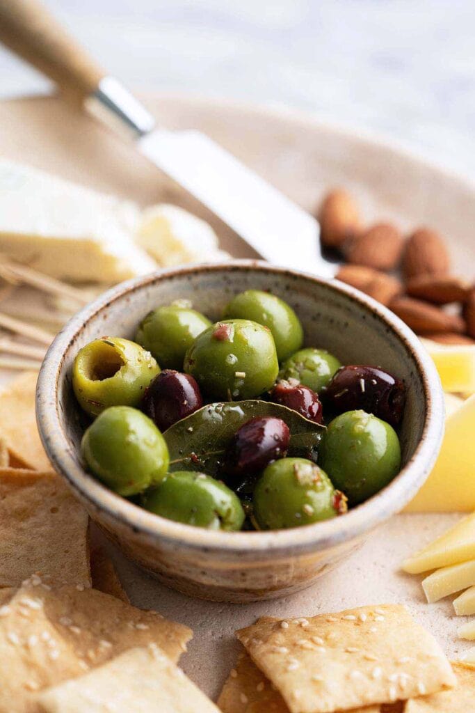 Marinated olives served in a bowl.