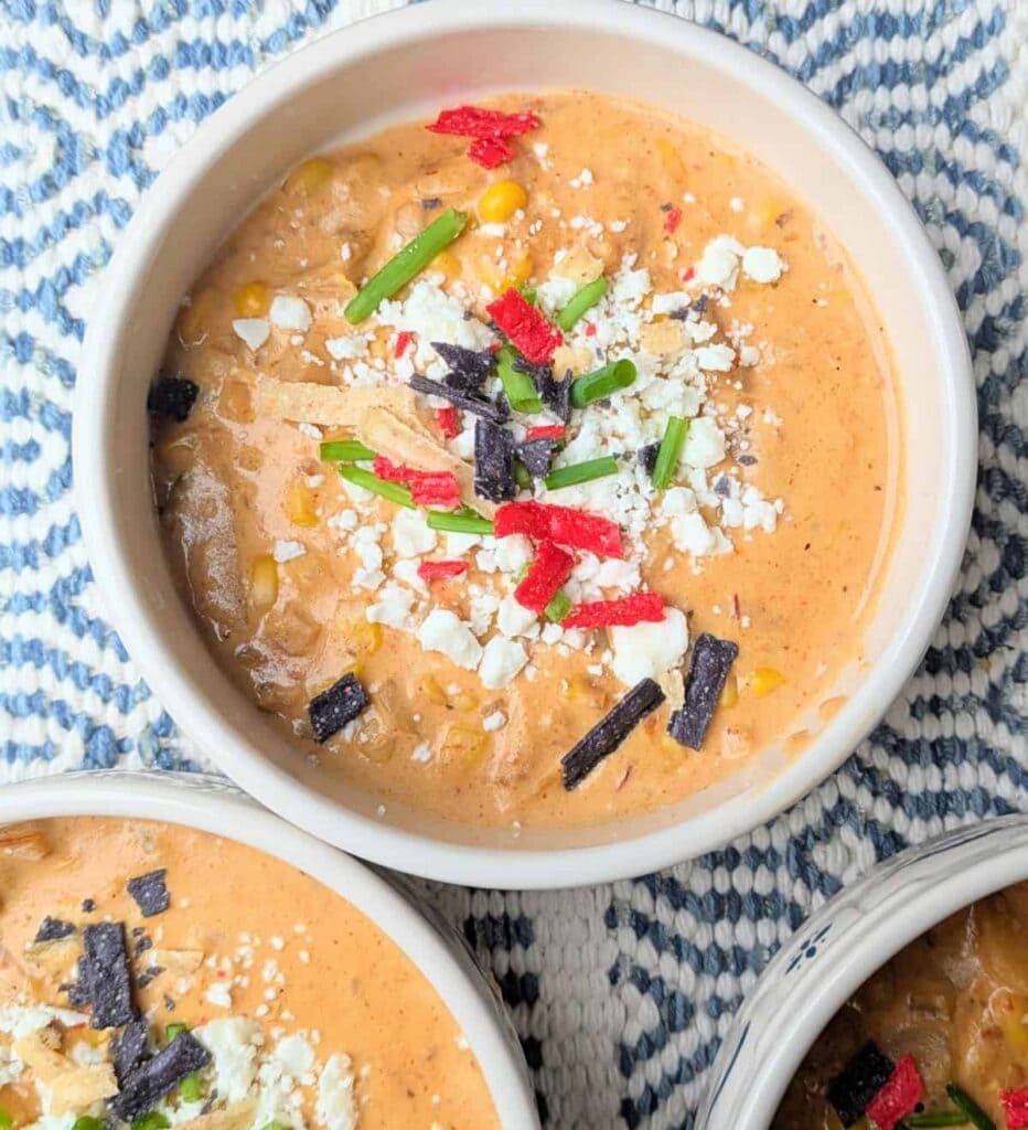 Mexican street corn soup served in a bowl.