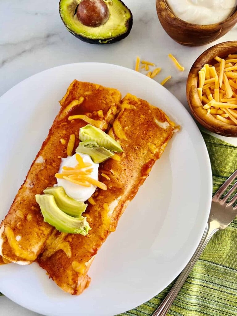 Potato enchiladas served on a plate.
