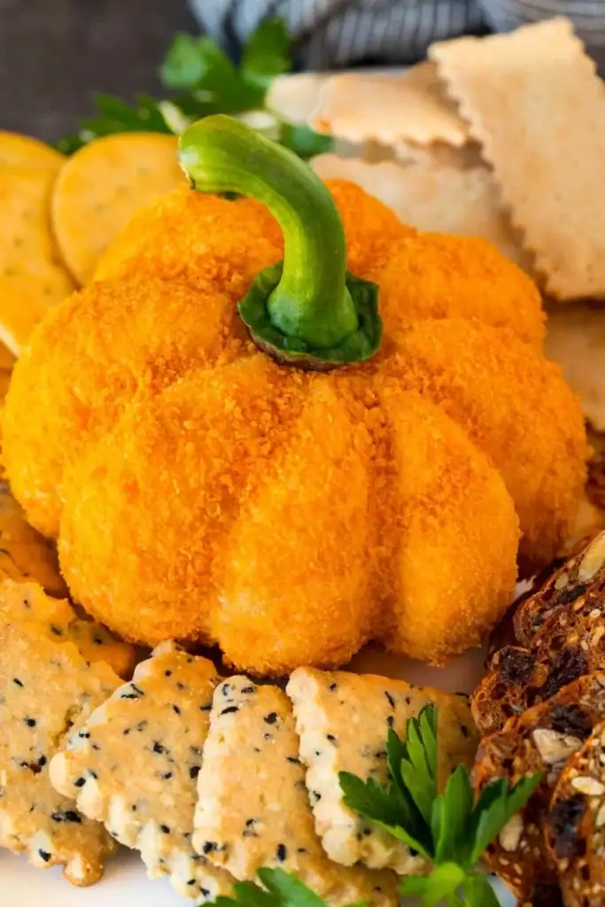 Close-up of a pumpkin cheese ball.