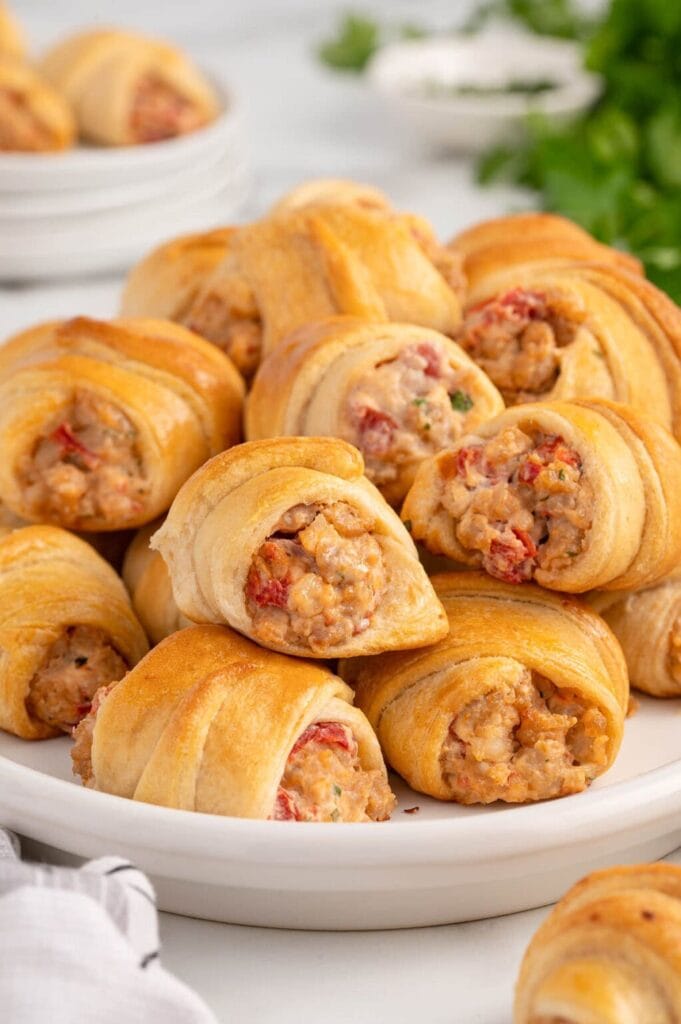 Sausage cream cheese crescent rolls on a plate.