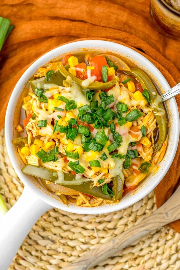 Slow cooker chicken fajita soup served in a bowl.