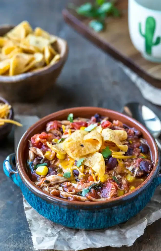 Slow cooker chicken Frito chili served in a bowl.