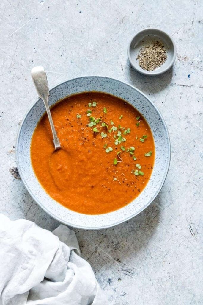 Slow cooker curried tomato soup served in a bowl.