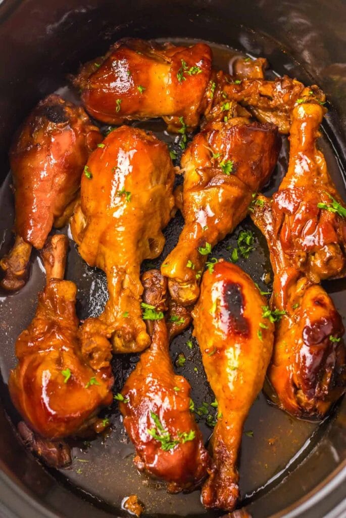 Dr. Pepper BBQ drumsticks in a slow cooker.