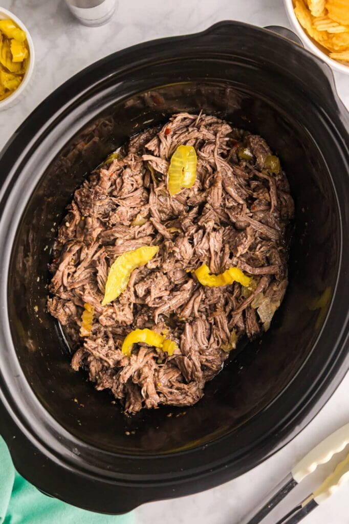 Italian beef sandwiches in a slow cooker.