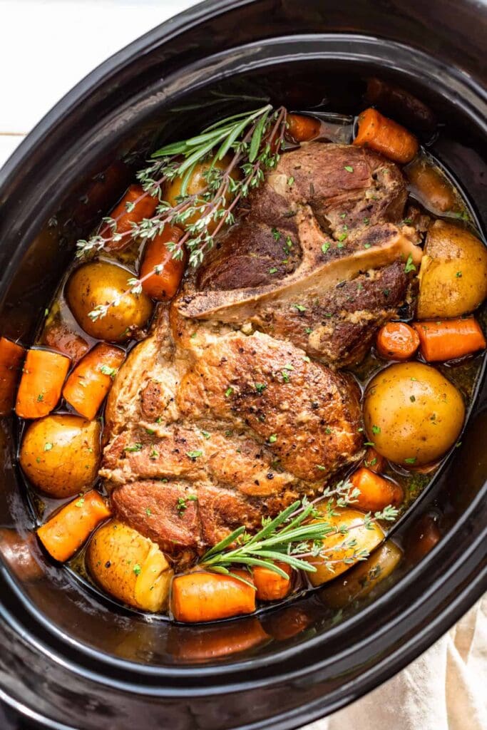 Slow cooker pork roast with vegetables.