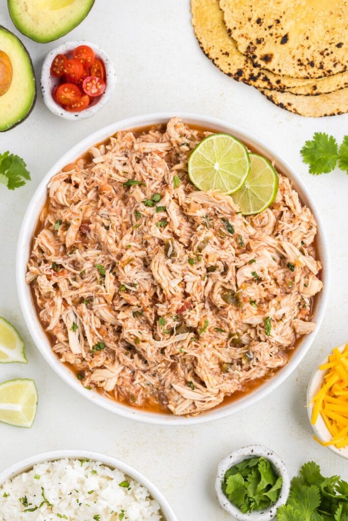 Slow cooker salsa chicken served in a bowl.