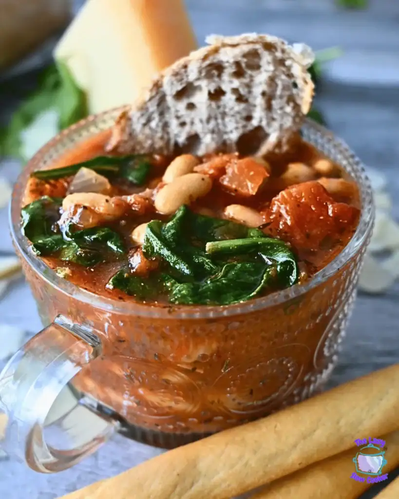 Slow cooker tomato white bean soup served in a bowl.