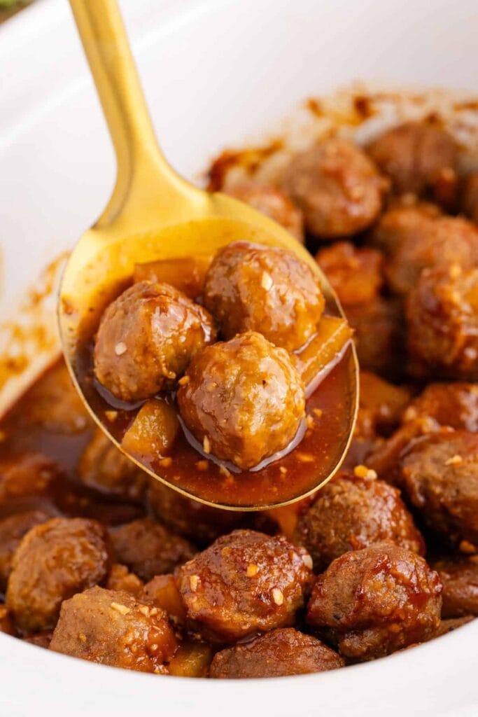 Sweet and sour meatballs in a crockpot.