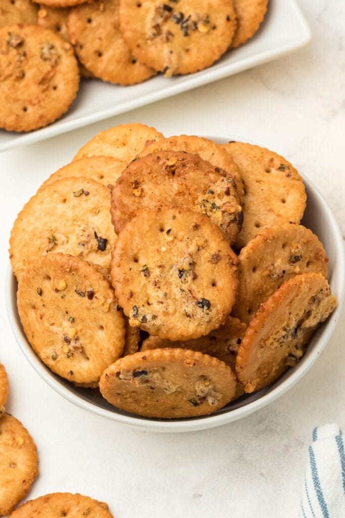 Zesty ranch Ritz crackers served in a bowl.