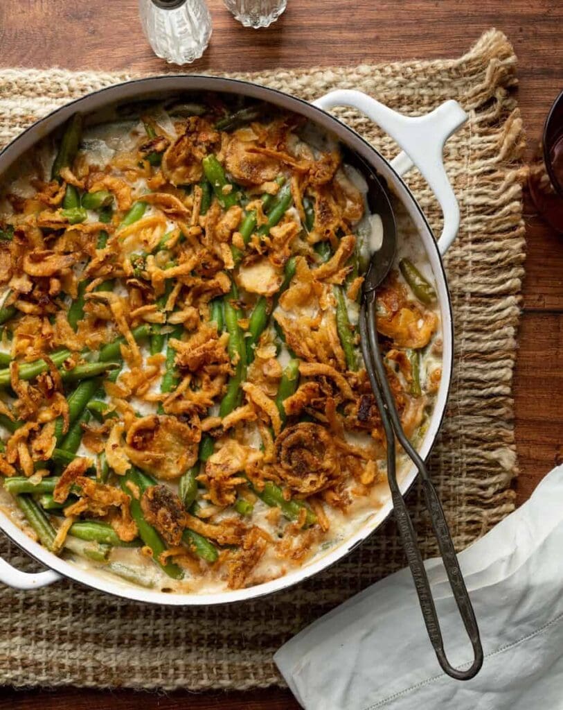 5-ingredient green bean casserole with crispy onions in a skillet.