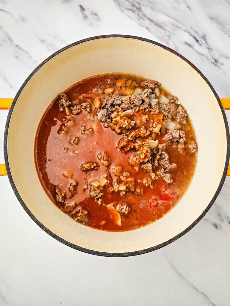 Enchilada sauce and broth added to the taco soup