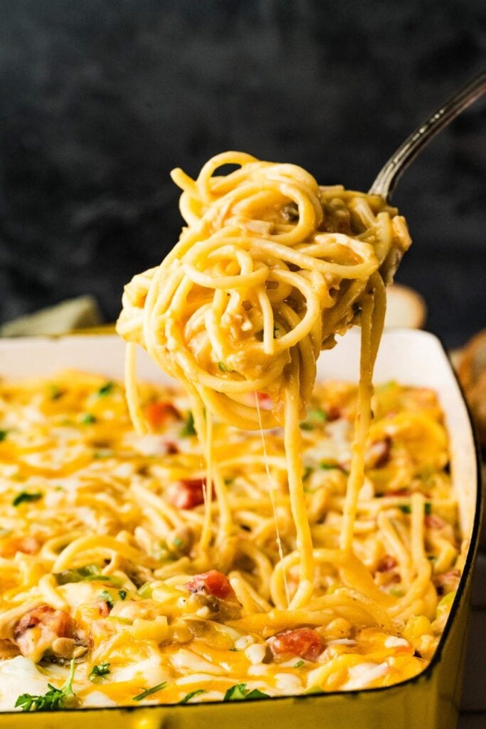 Chicken spaghetti casserole in a baking dish.
