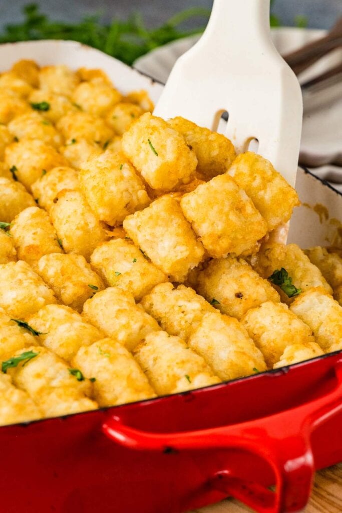 Close-up of chicken tater tot casserole in a baking dish.