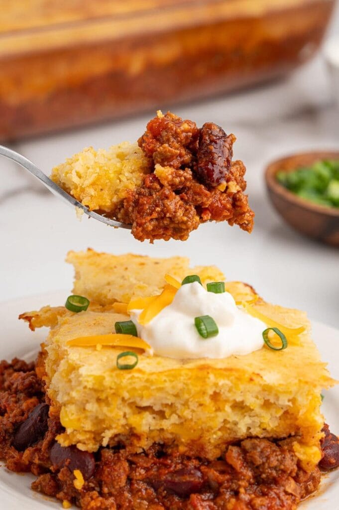 Chili cornbread casserole on a plate.