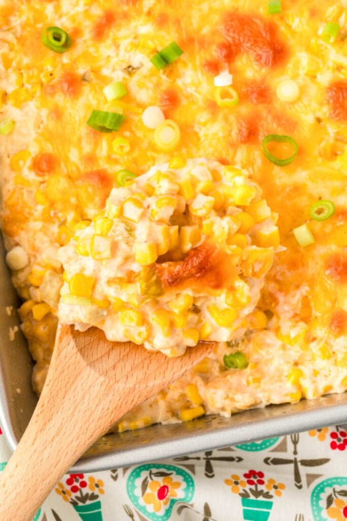 Cream cheese corn casserole in a baking dish.