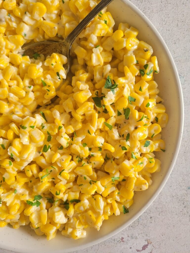 Cream cheese with corn in a bowl.