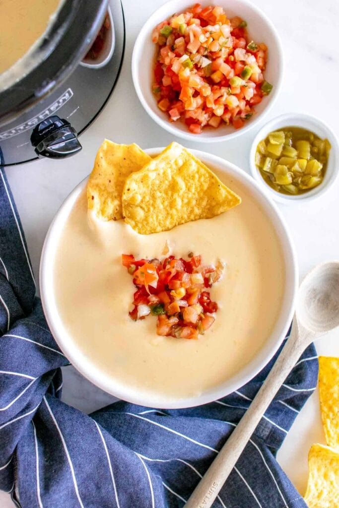 Crockpot white queso in a bowl.