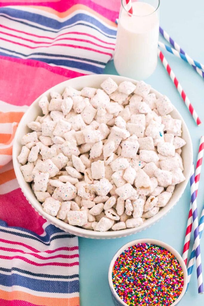 Funfetti puppy chow in a bowl.