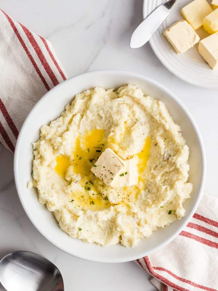 Garlic herb mashed potatoes in a bowl.