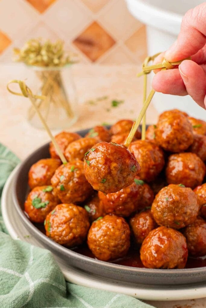 Grape jelly meatballs in a bowl.