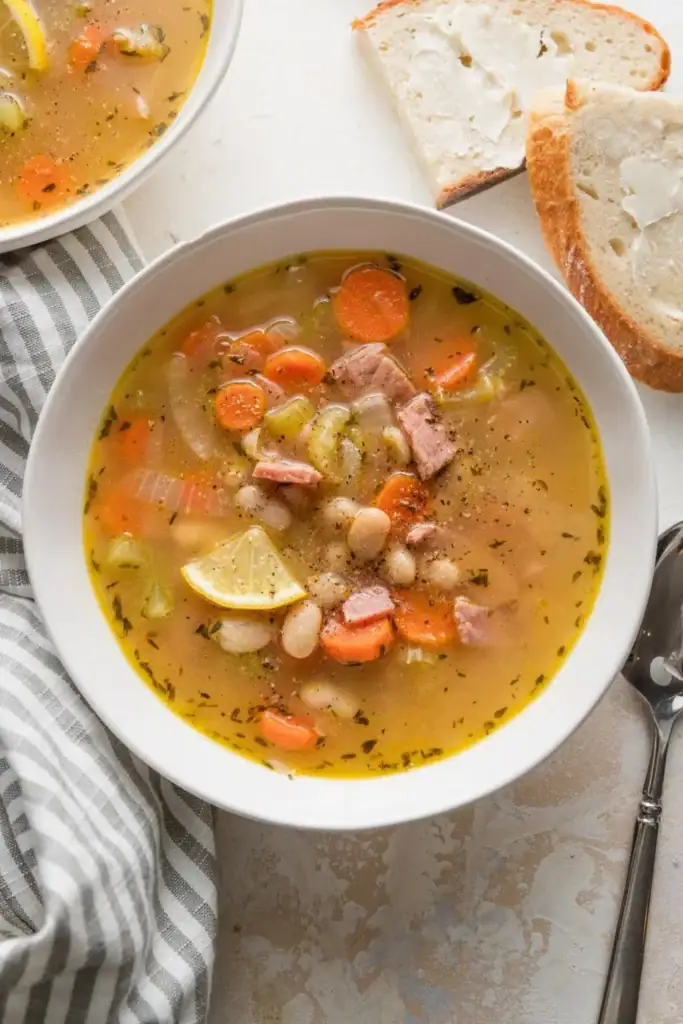 Ham and bean soup with tender ham and beans in a bowl.