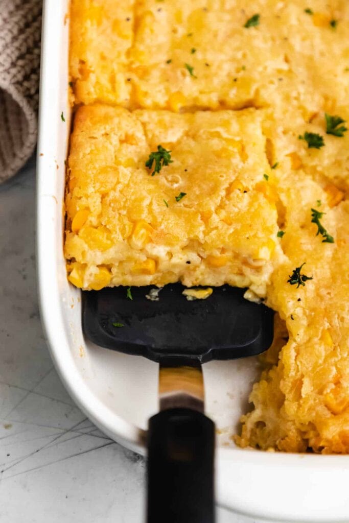 Jiffy corn casserole in a baking dish.