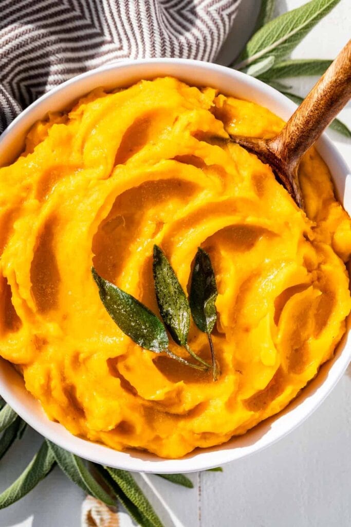 Mashed butternut squash in a bowl.
