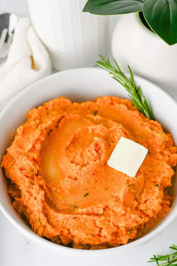 Mashed sweet potatoes in a bowl.