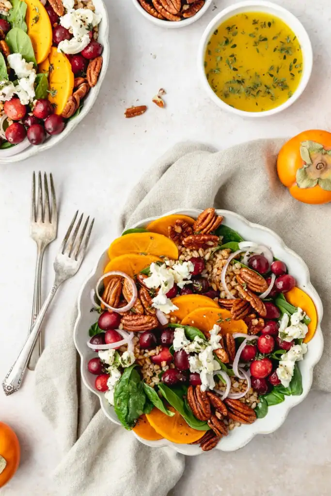 Persimmon salad in a bowl.