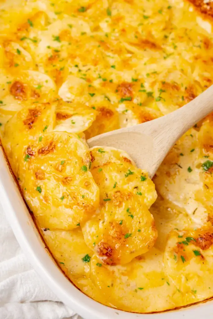 Scalloped potatoes in a baking dish.