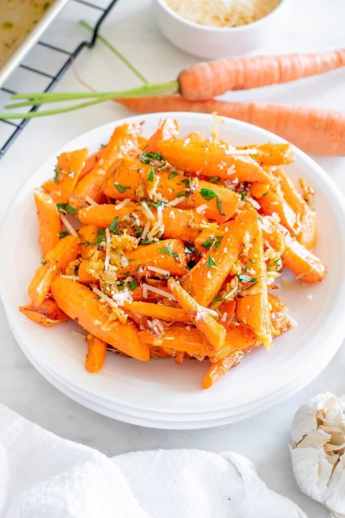 Sheet pan roasted carrots on a plate.