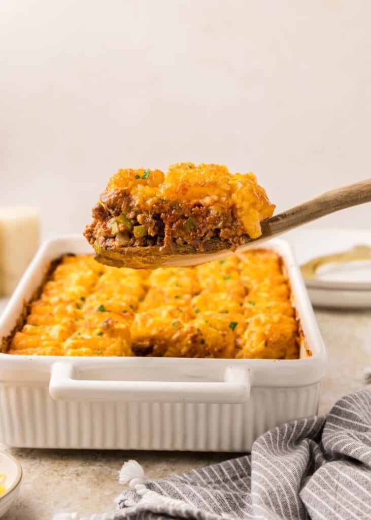 Sloppy Joe casserole on a wooden spoon.