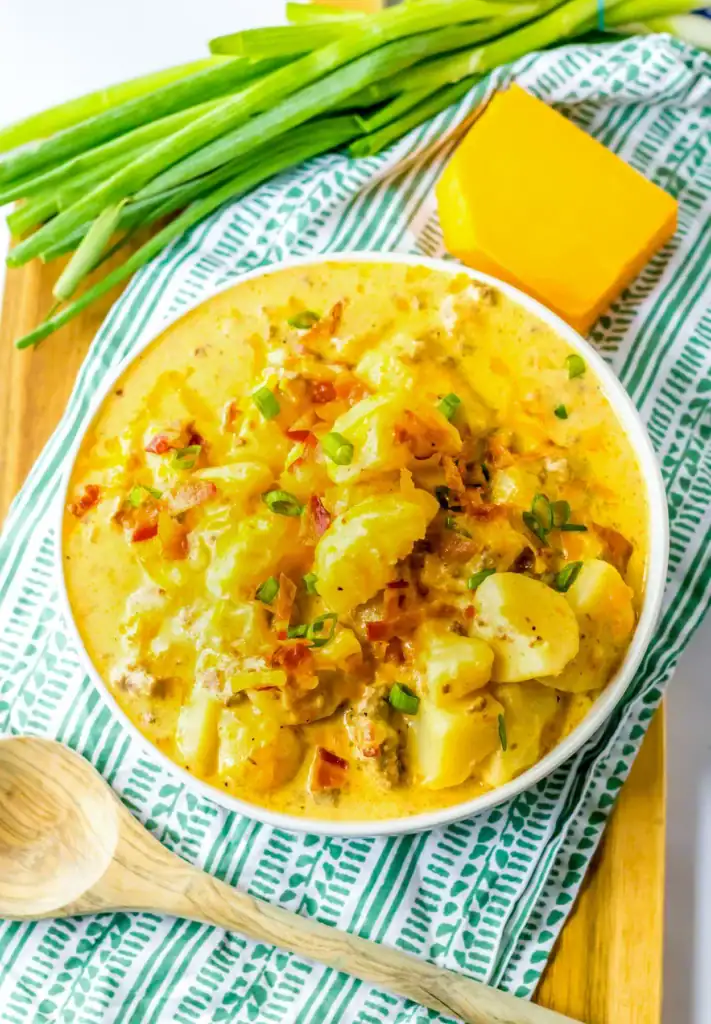 Slow cooker bacon cheeseburger soup in a bowl.