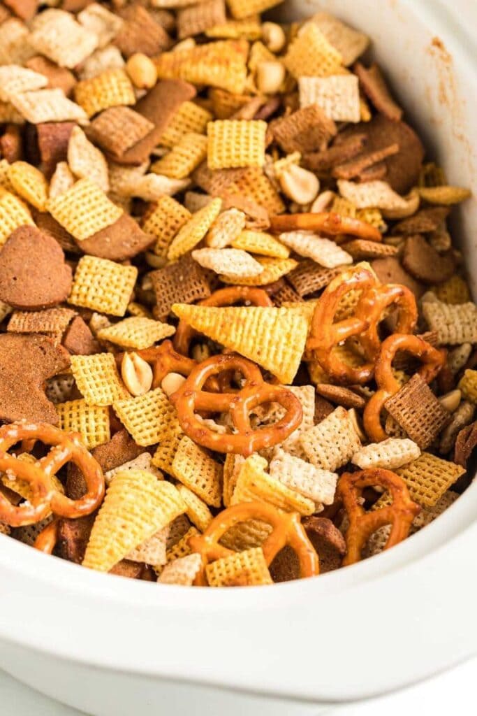 Slow cooker Chex Mix in a serving dish.