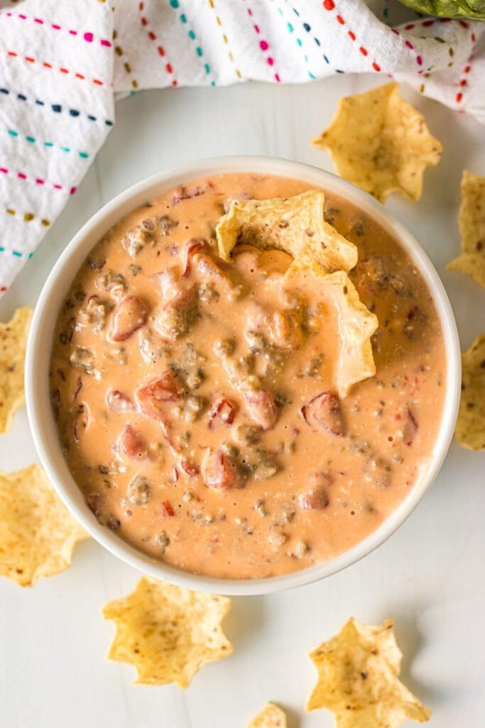 Slow cooker sausage cheese dip in a bowl.