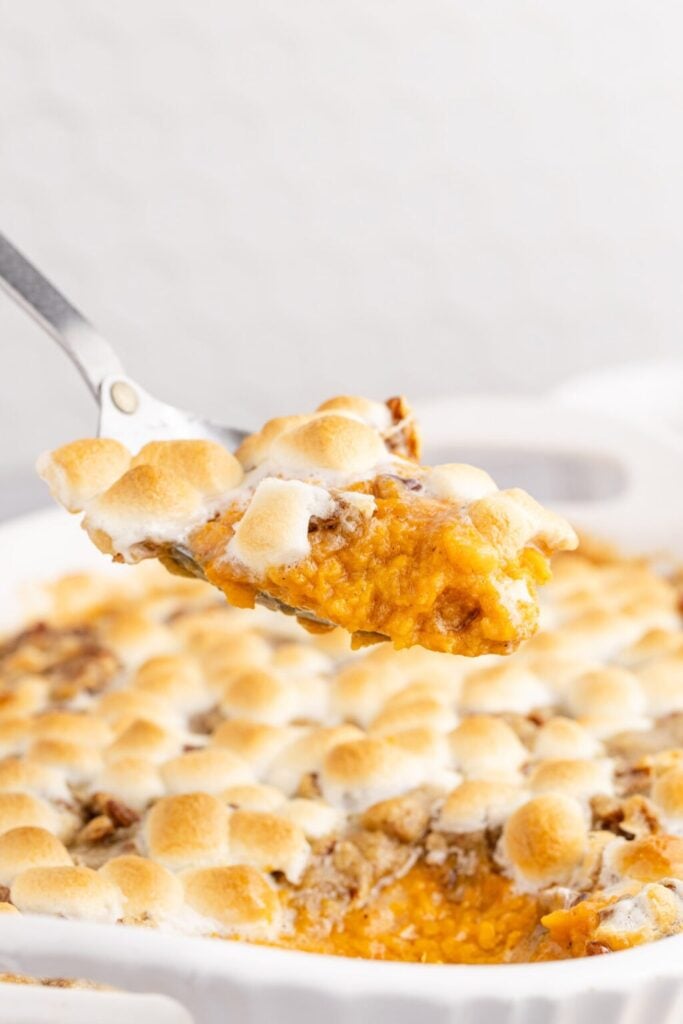 Sweet potato casserole on a spoon.