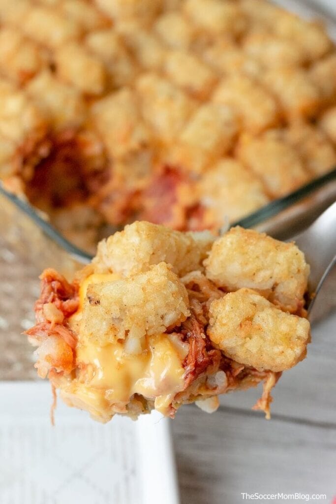 Tater tot casserole on a spoon.
