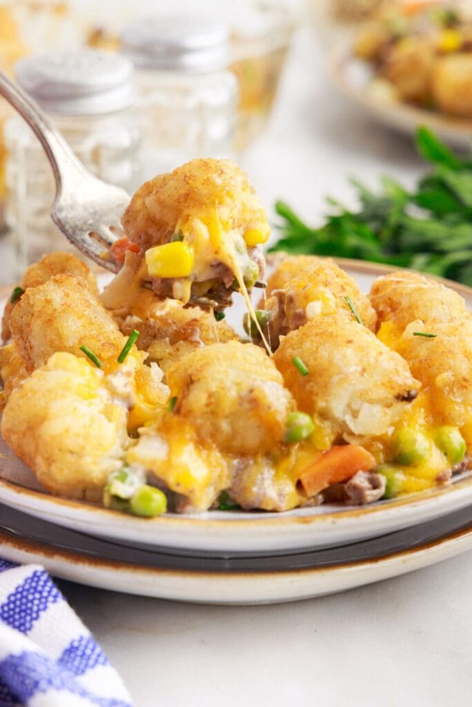 Tater tot casserole on a plate.