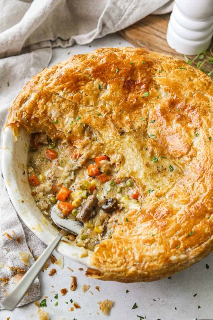 Vegetarian pot pie with vegetables in a pie dish.