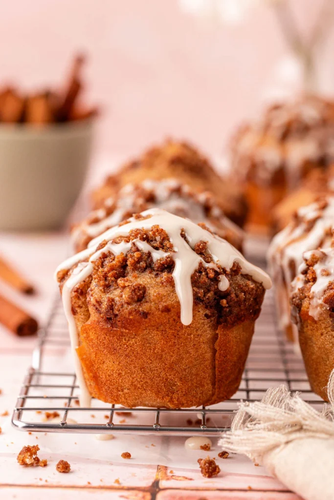 Cinnamon muffins on baking sheet.