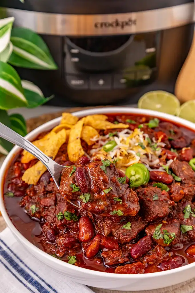 Crockpot steak chile con carne in a bowl.