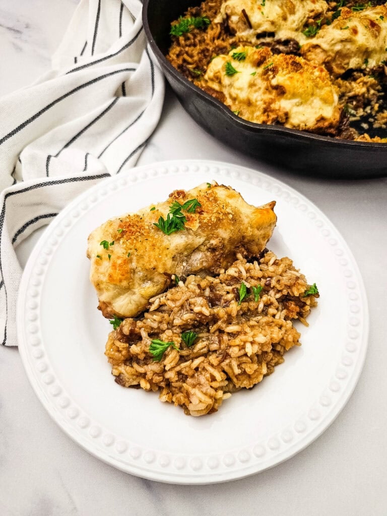 French onion chicken and rice bake on a plate.