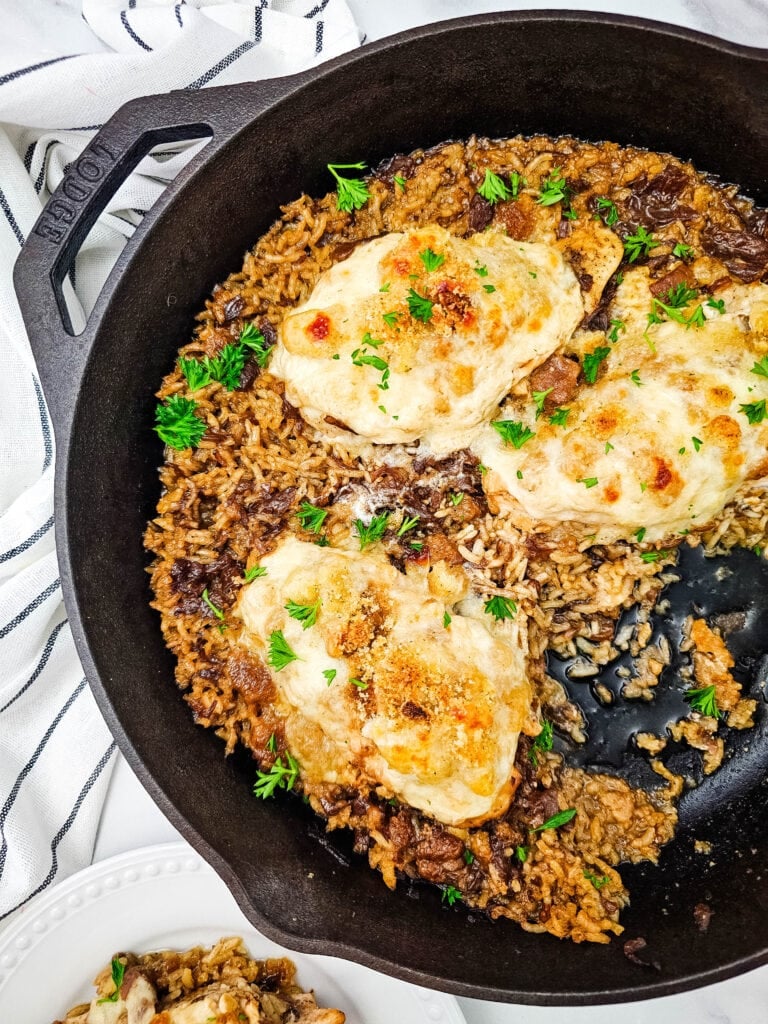 French onion chicken and rice bake in a skillet.