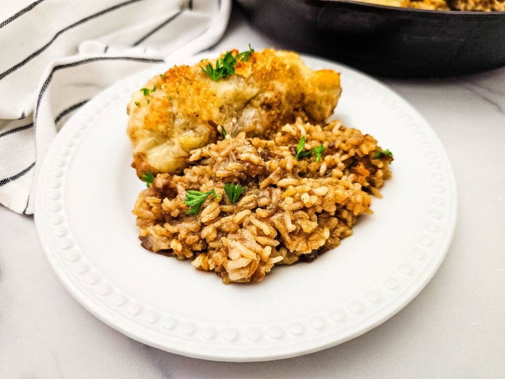 French onion chicken and rice bake on a plate.